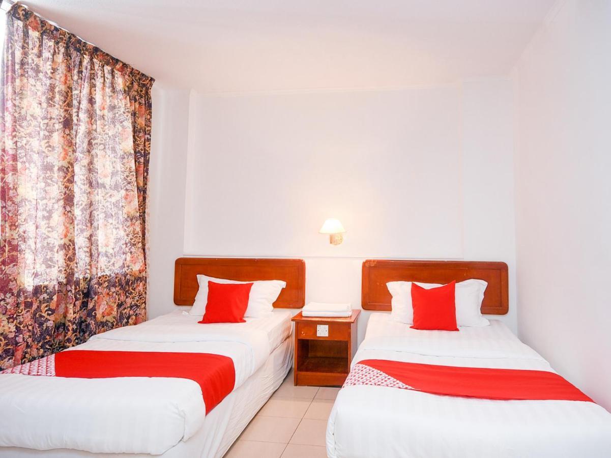 Oyo 989 Ostay Inn Мірі Екстер'єр фото